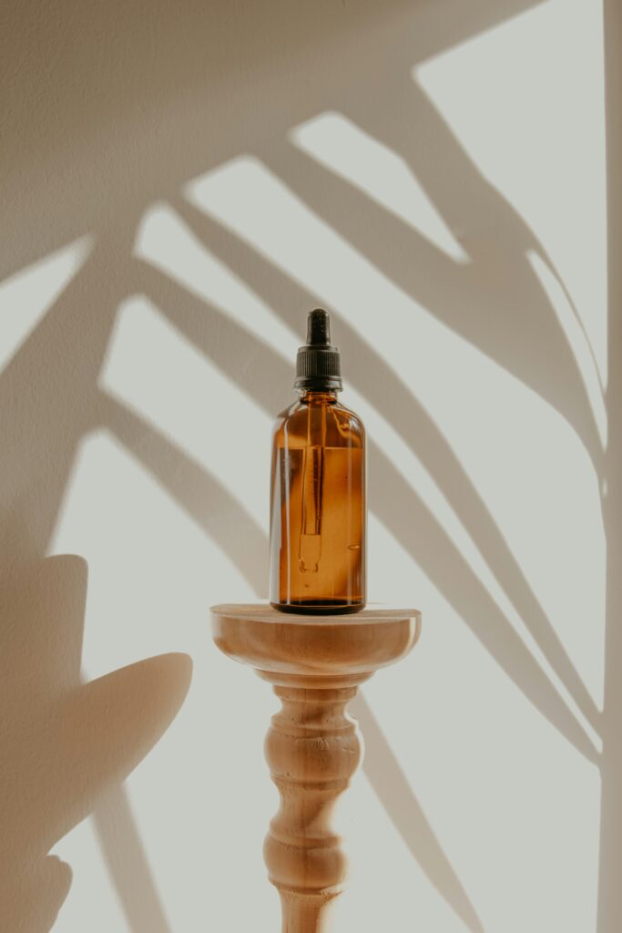 White background brown serum bottle