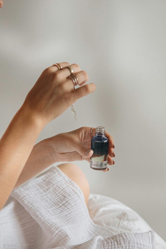 White background women hands  lactacid acid serum