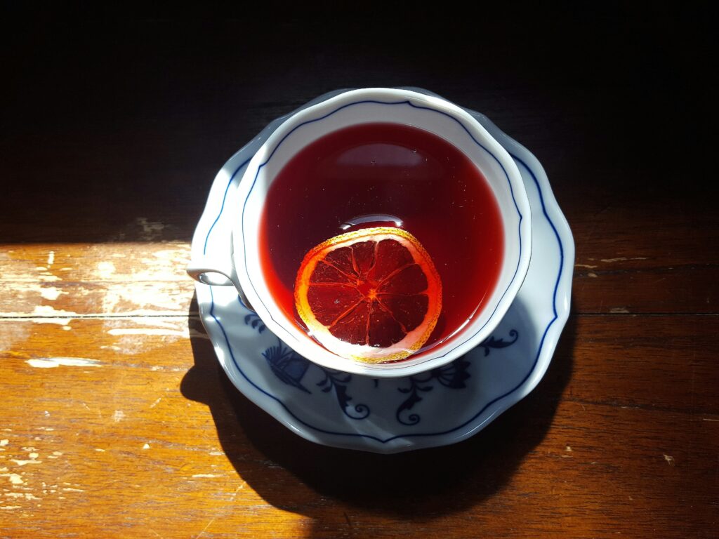 Organic dried red raspberry leaves in a cup of tea