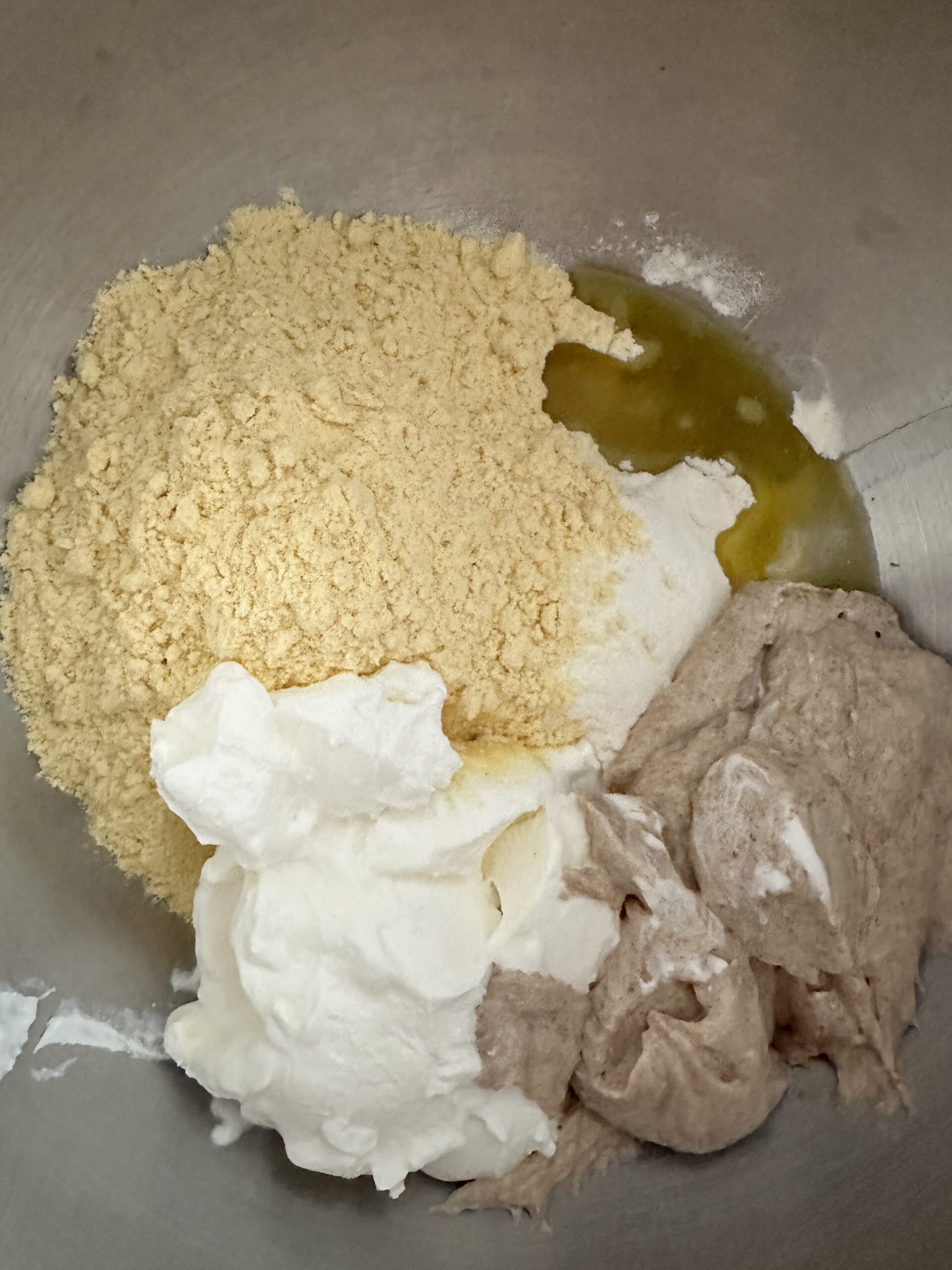 Mixing sourdough discard tortilla dough ingredients in a bowl